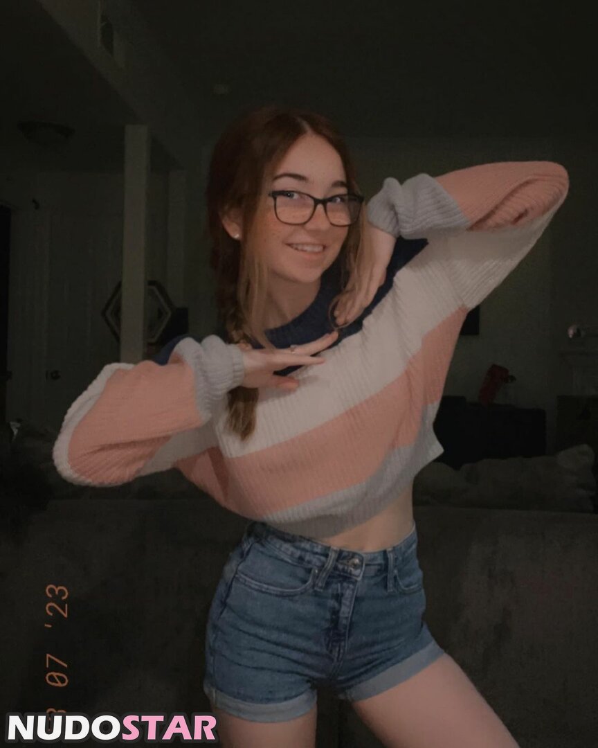 Lyssaurora's hand teasing her own skin