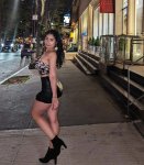 Photo by Isabella on June 16, 2024. May be an image of 1 person, miniskirt and text.jpg