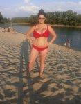 Irina P. - Brunette Busty Beauty in a Red Bikini Full Body Shot at the Beach.jpg