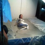 Kim-Kardashian-laying-down-in-silver-paint.jpg